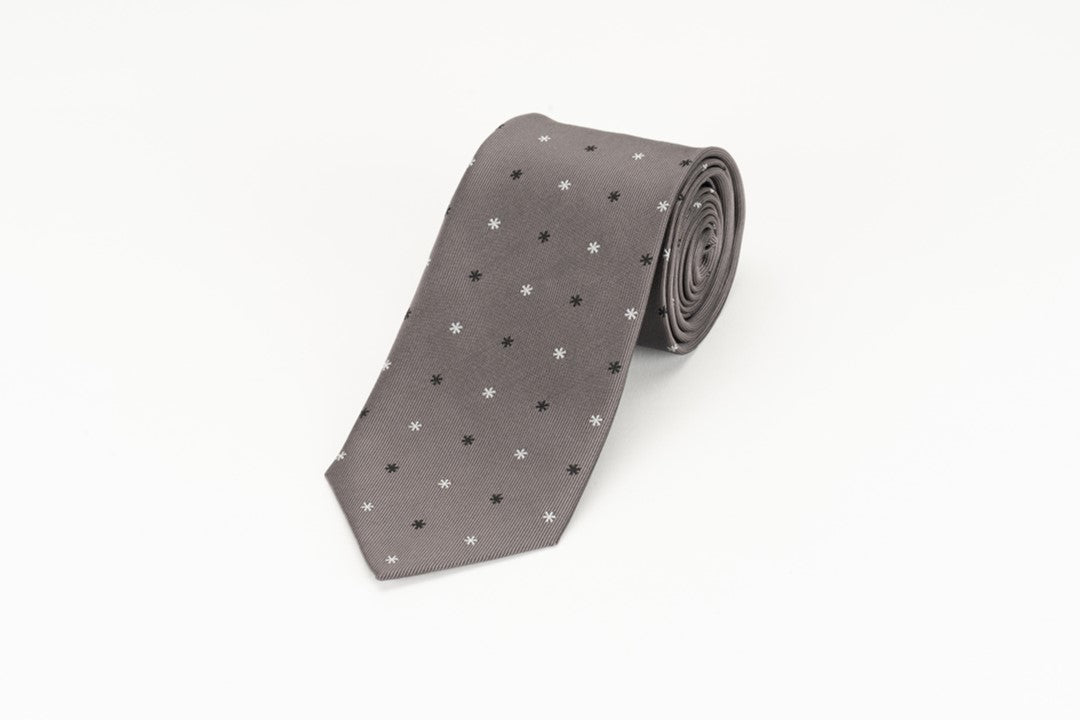 This is a gray necktie made of 100% silk.